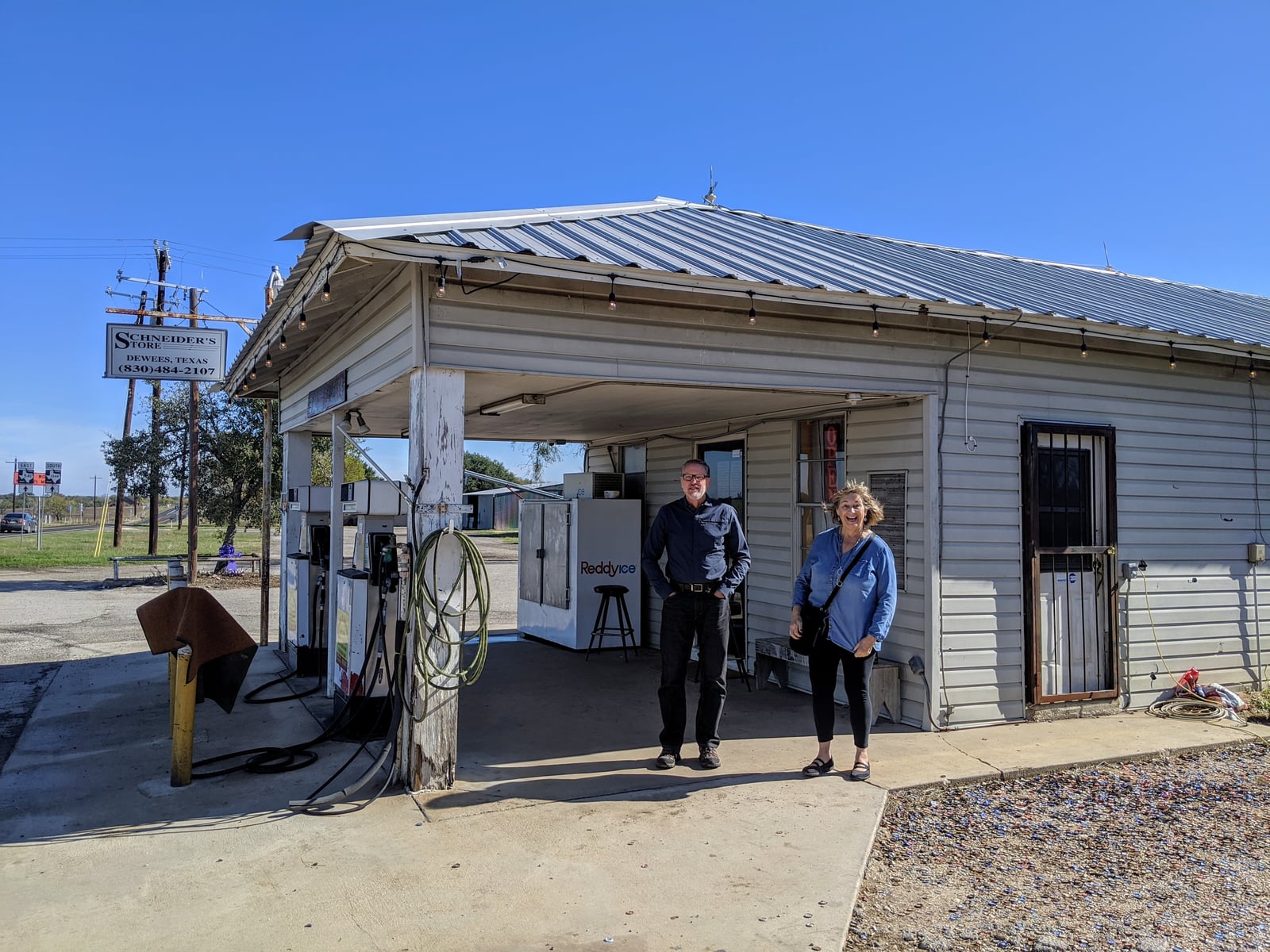 Schneider's Store in Dewees, a declining Texas small town — the kind of rural settlement that generates ghost-town folklore like Belcherville