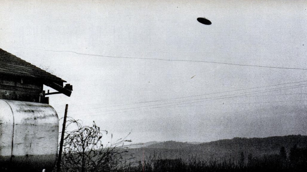Alleged flying saucer photograph taken by Oregon farmer Paul Trent on May 11, 1950 — one of the most widely reproduced UFO photographs of the 1950s era, contextualizing the national wave of sighting reports that reached rural Texas