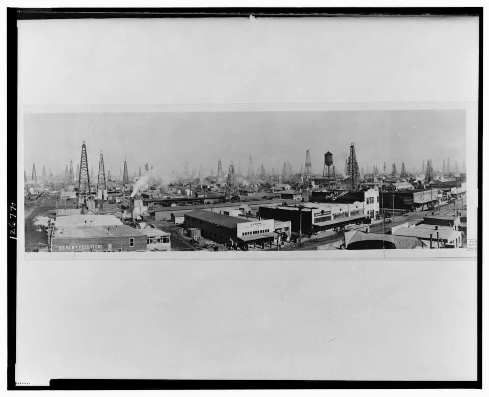 Panoramic view of the Burkburnett, Texas oil field in January 1919, showing dozens of wooden derricks across the North Texas landscape