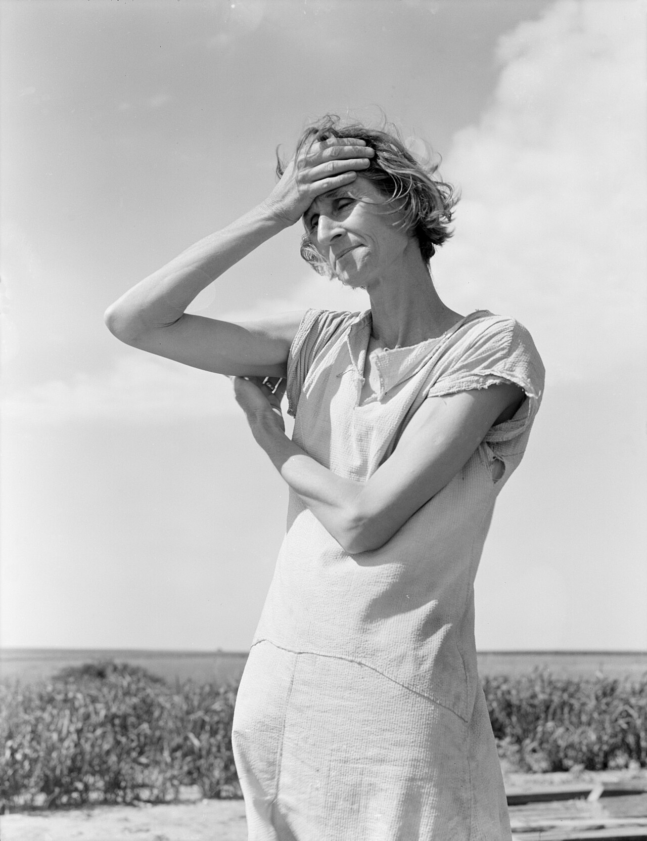 Nettie Featherston, wife of a migratory farm laborer with three children, near Childress, Texas — North Texas working family, June 1938