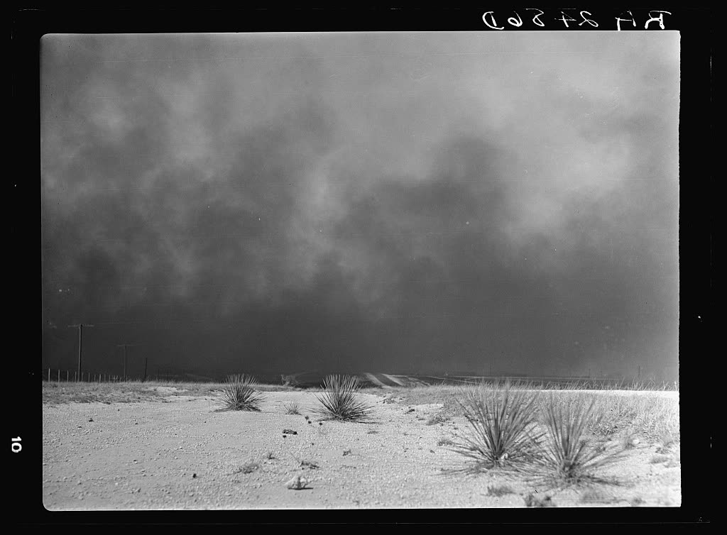 Heavy black clouds of a dust storm rising over the Texas Panhandle in 1936, photographed by Arthur Rothstein for the Farm Security Administration during the Dust Bowl that devastated Montague County agriculture