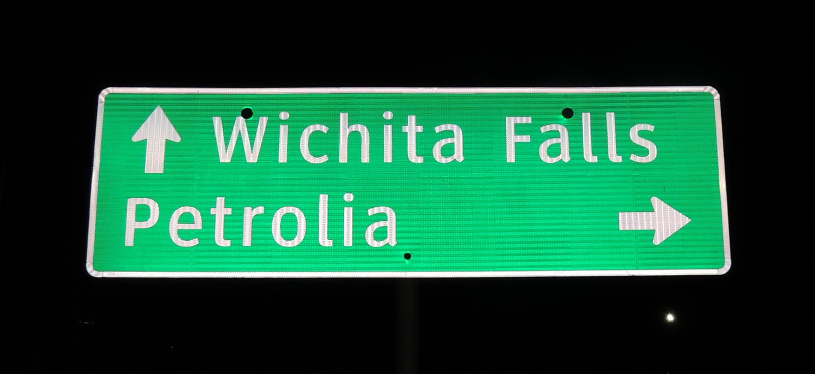 US Route 82 junction road sign at Petrolia and Wichita Falls, north Texas highway corridor