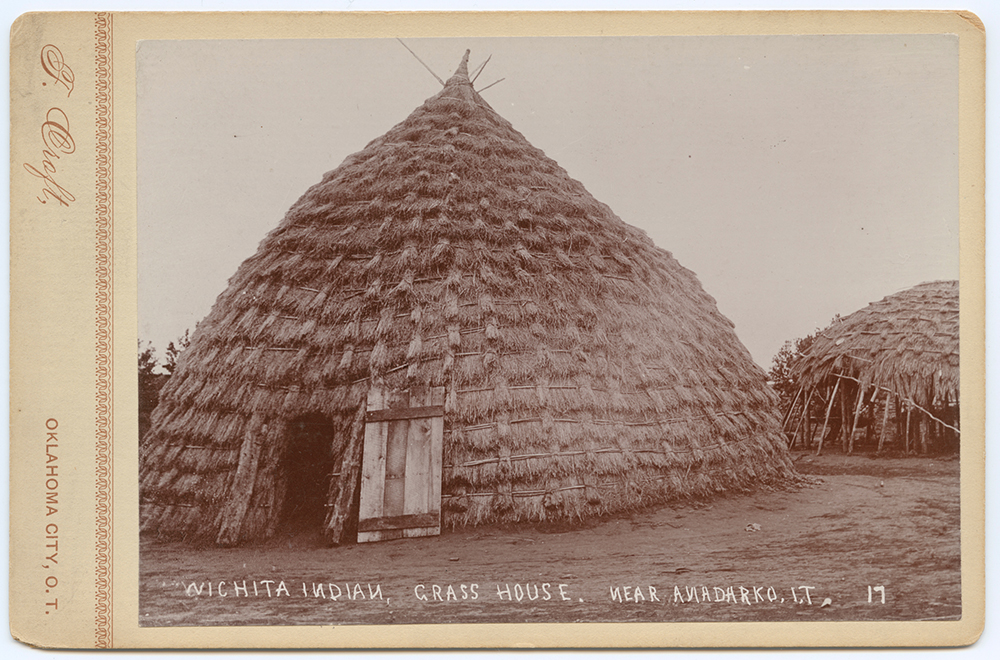 Wichita grass lodge near Anadarko, Indian Territory, c. 1885–1900 — Wichita peoples share a Caddoan language family with Caddo, and their grass-thatched dome lodges reflect a shared architectural tradition