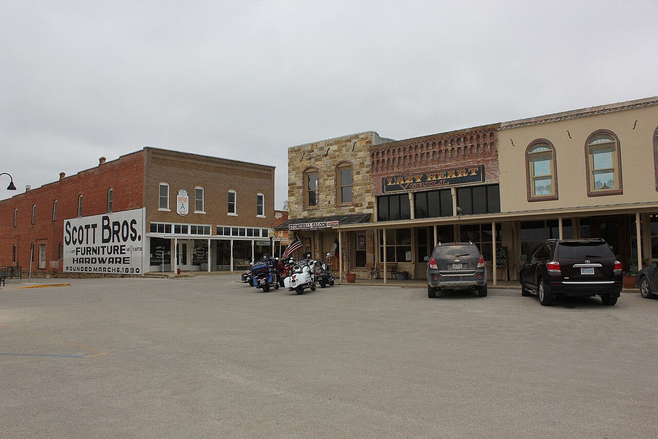 The Stonewall Saloon Museum on Saint Jo's town square — 1873 native stone construction, one of the best-preserved Chisholm Trail-era commercial buildings in Montague County